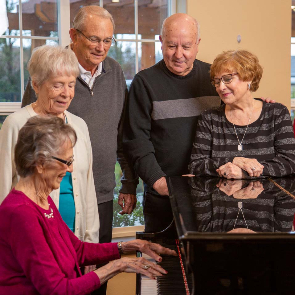 Bear Hollow Estates seniors playing piano