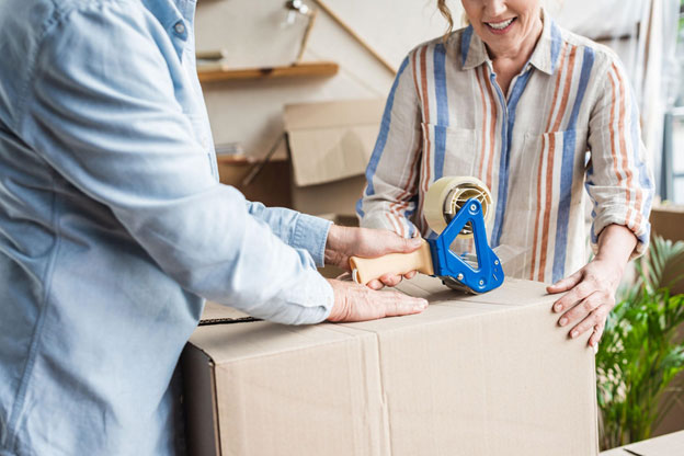 Sacramento seniors packing a box
