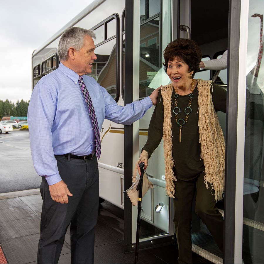 Bear Hollow Estates helping lady off bus